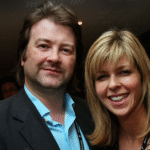 Kate Garraway and her new partner sharing a heartfelt moment, symbolizing a new beginning and love after personal heartbreak.